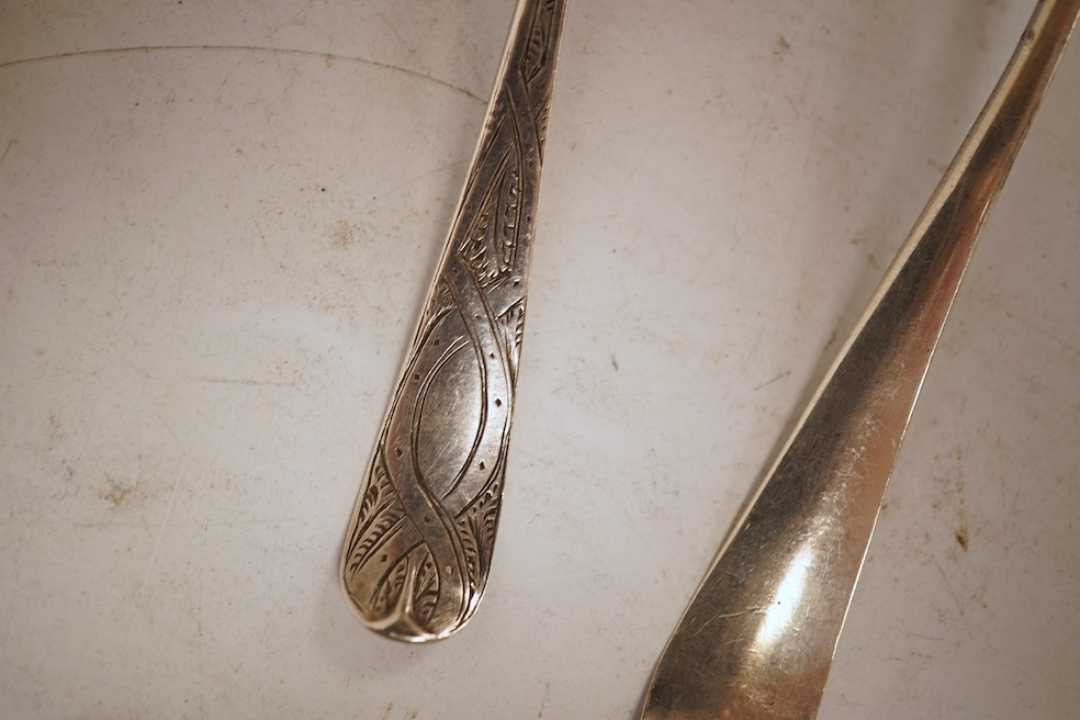 A collection of twenty nine assorted Georgian picture back teaspoons, various dates and makers, including three with masted ship, some marks indistinct, 10.2oz.